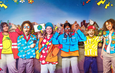 Six children are stood on a street. Their outfits are overdrawn in a cartoon style in vibrant colours and patterns. They all have amused or excited expressions. There are cartoon flowers, bolts and arrows framing the image.